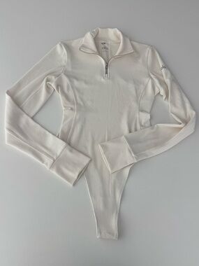 Cream Alo Yoga Ribbed Zipfront Longsleeve Bodysuit